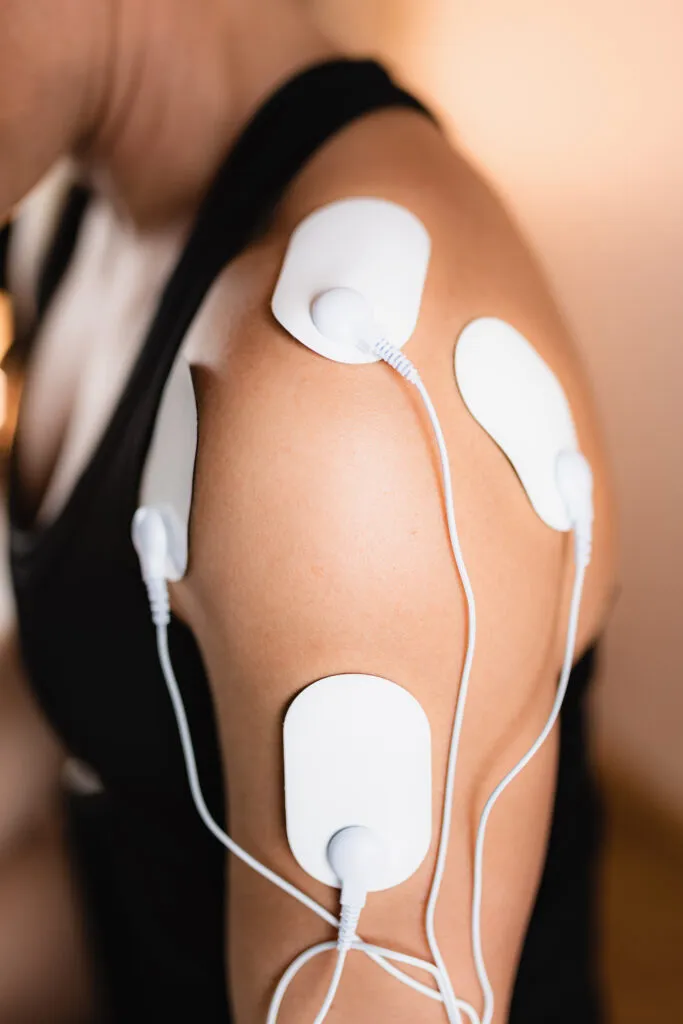 Electrical stimulation therapy for shoulder pain as part of personal injury treatment